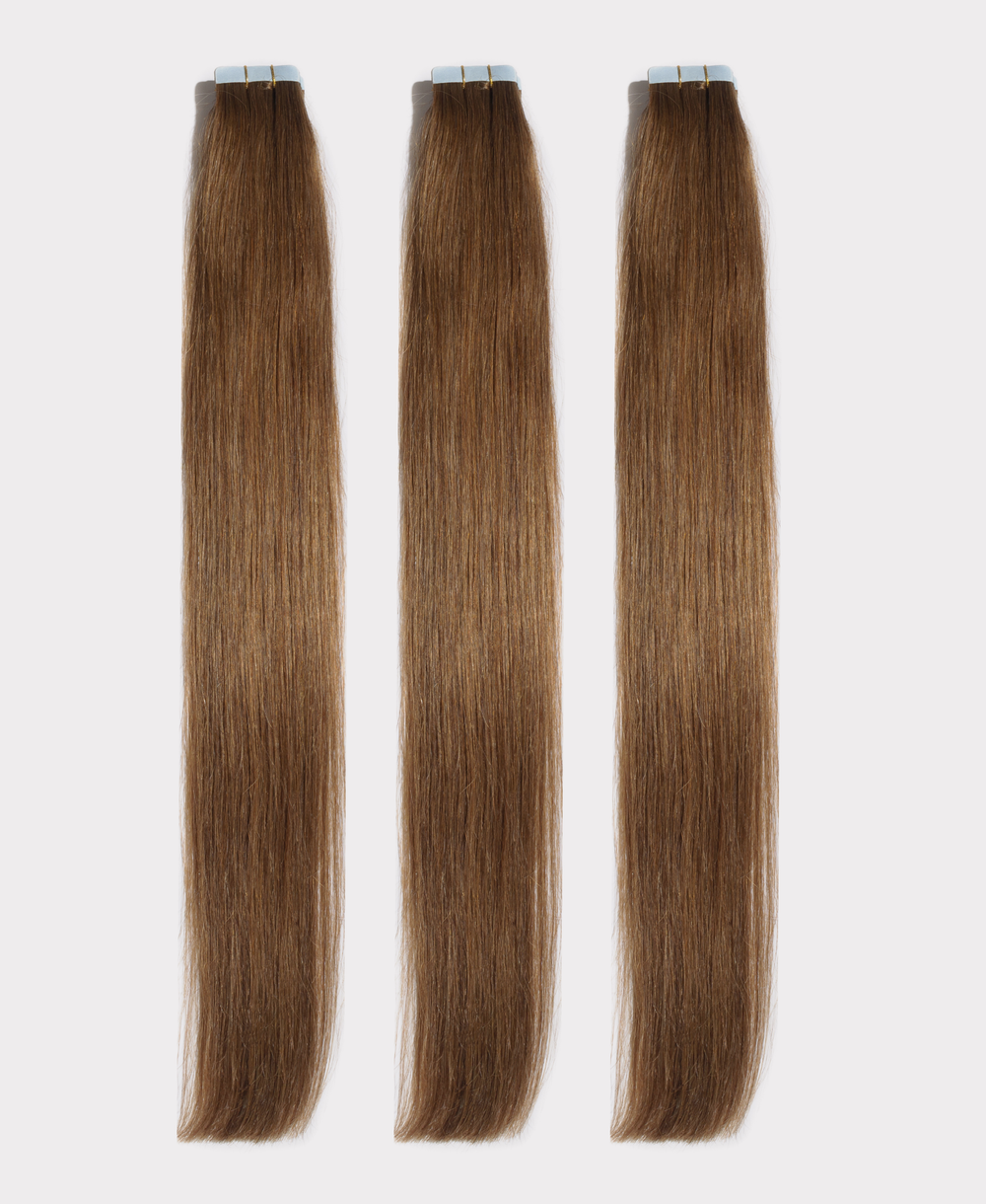 Long straight hair extensions matching the Caramel color