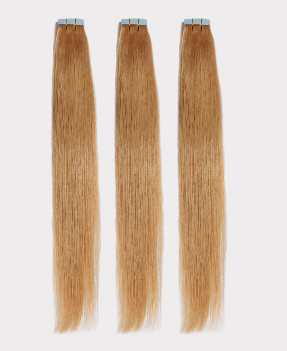 Long straight hair extensions matching the Champagne color