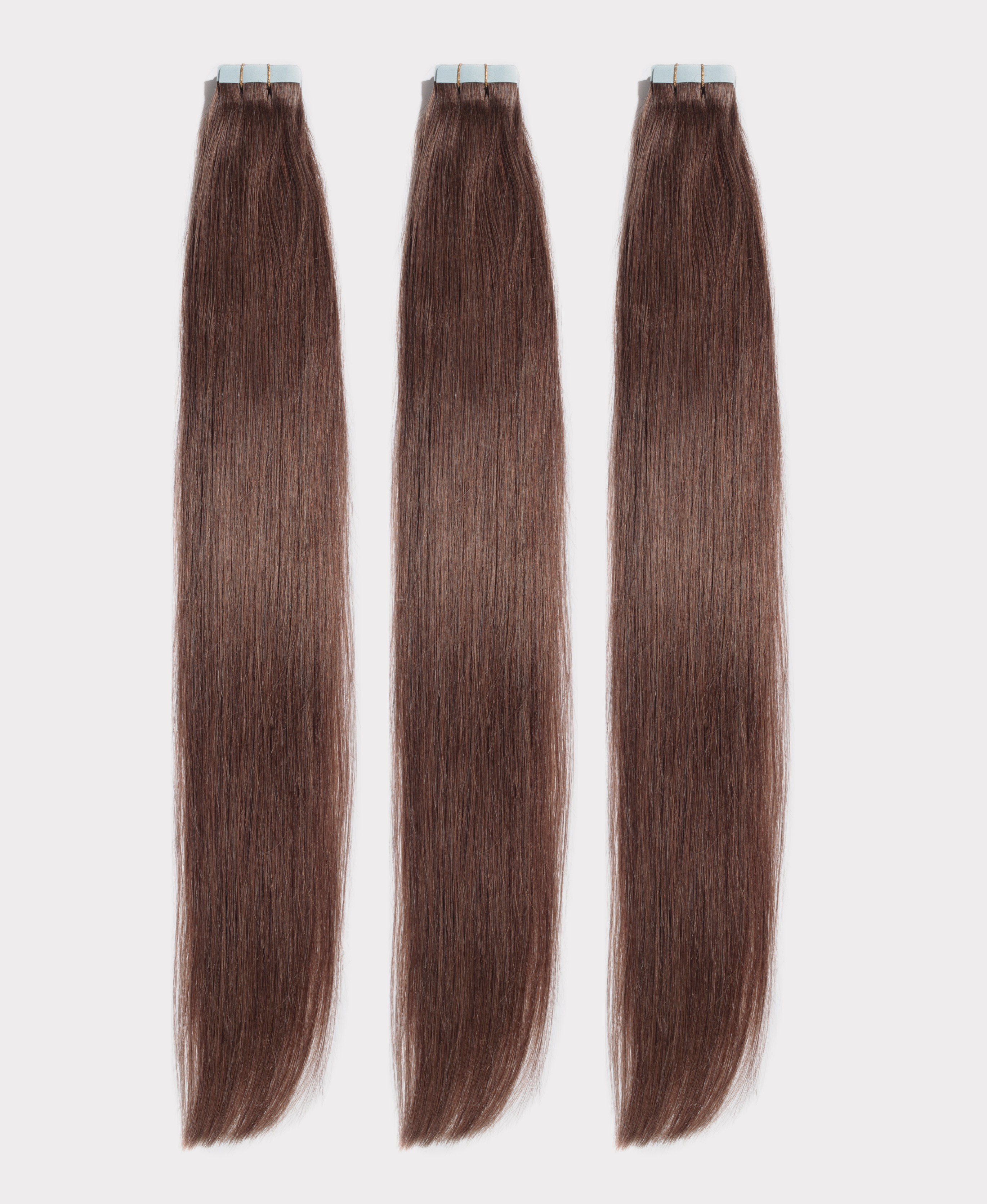 Long straight hair extensions matching the Hot toffee color