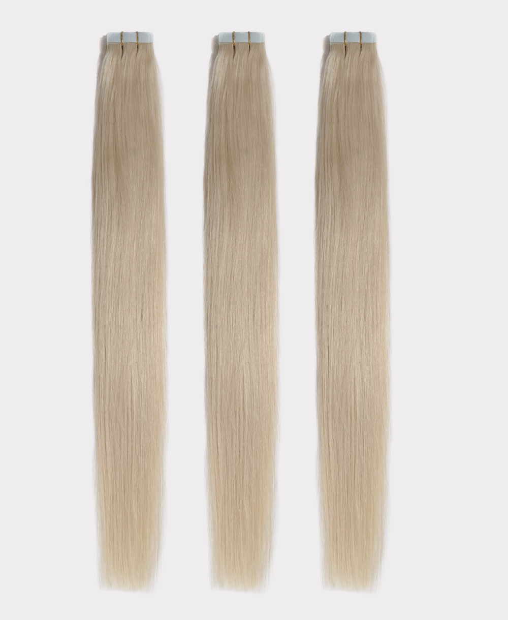 Long straight hair extensions matching the Ash blonde color