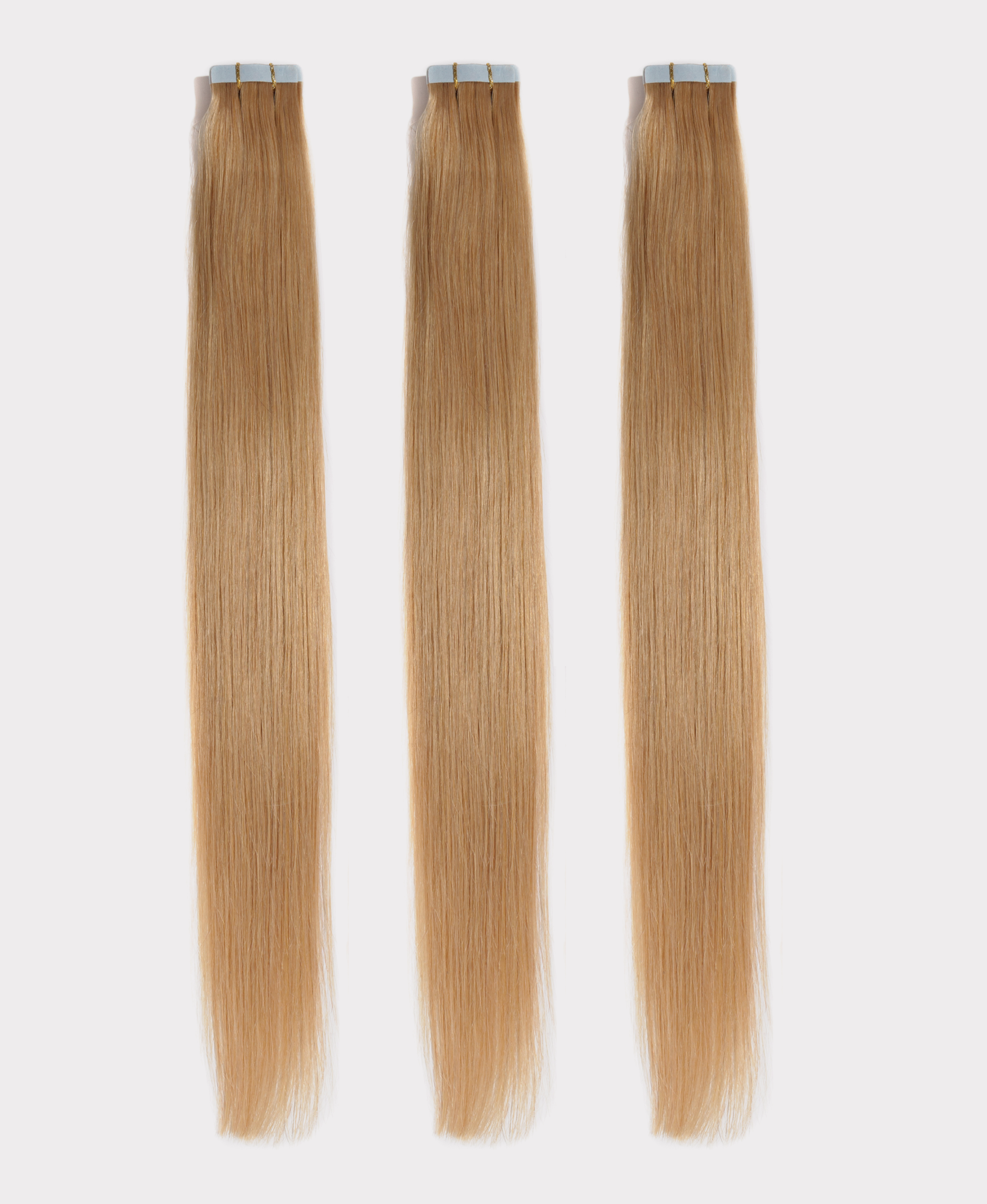 Long straight hair extensions matching the Beeline honey color