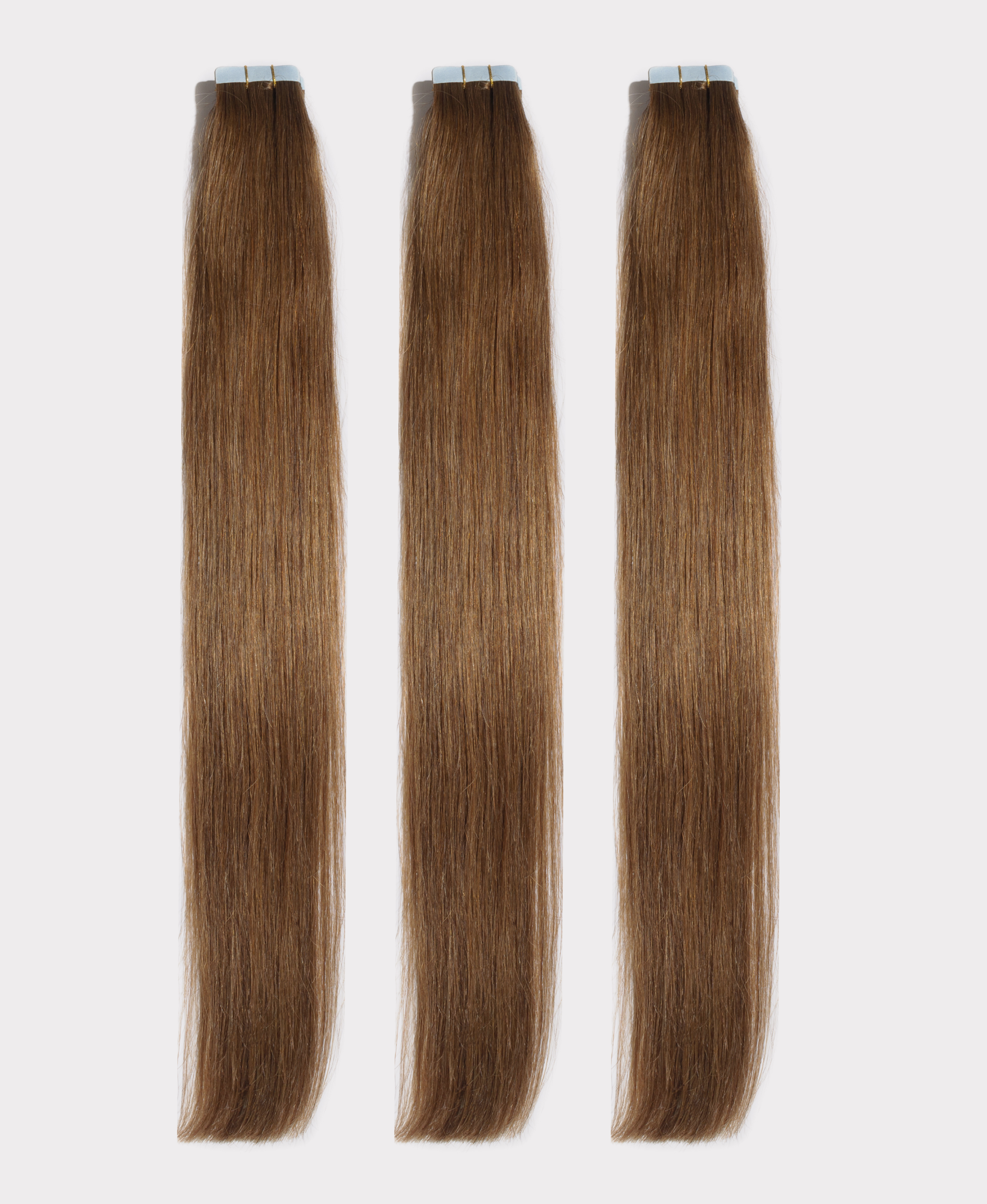 Long straight hair extensions matching the Caramel color