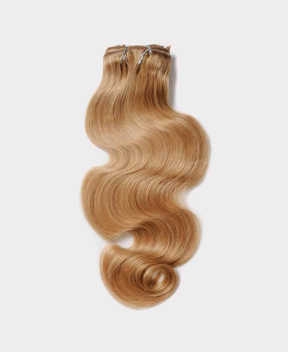 Long wavy hair extensions matching the Champagne color