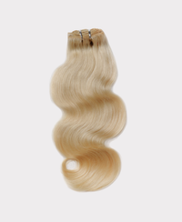 Long wavy hair extensions matching the Light blonde color